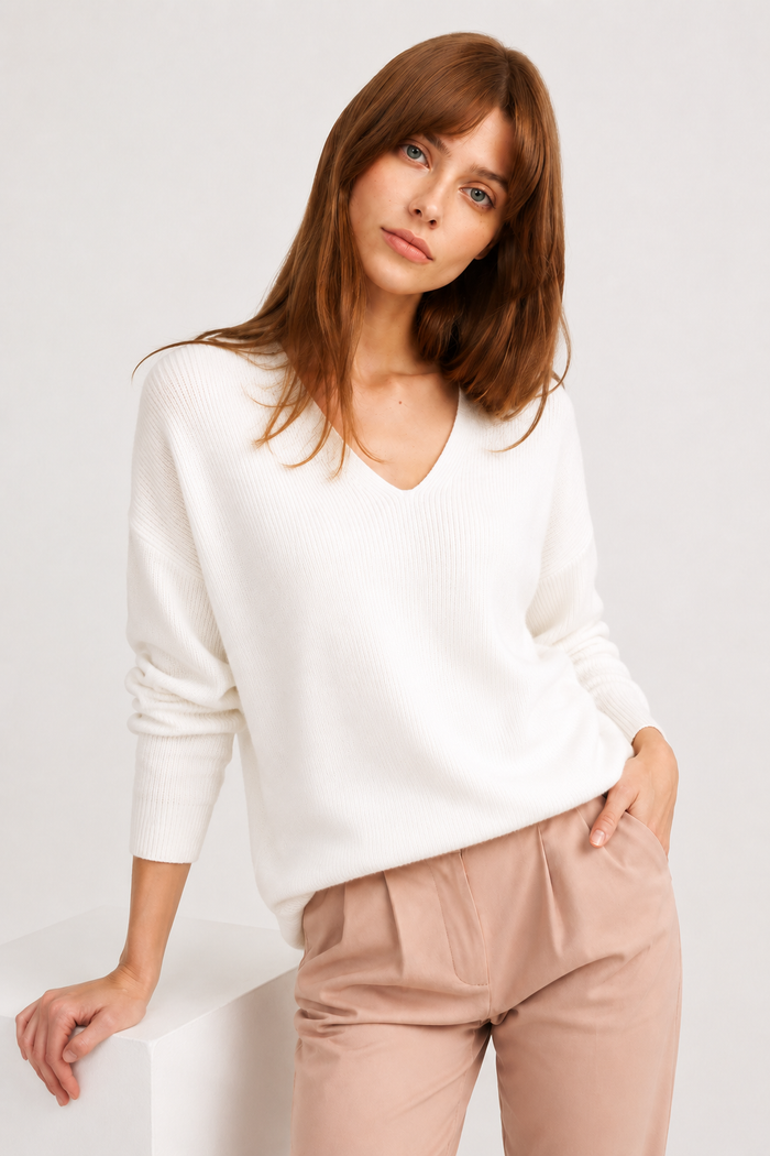 Black sweater with a free cut - White