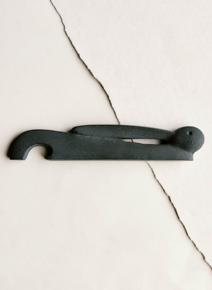 Beige cast iron rabbit bottle opener
