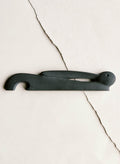Beige cast iron rabbit bottle opener