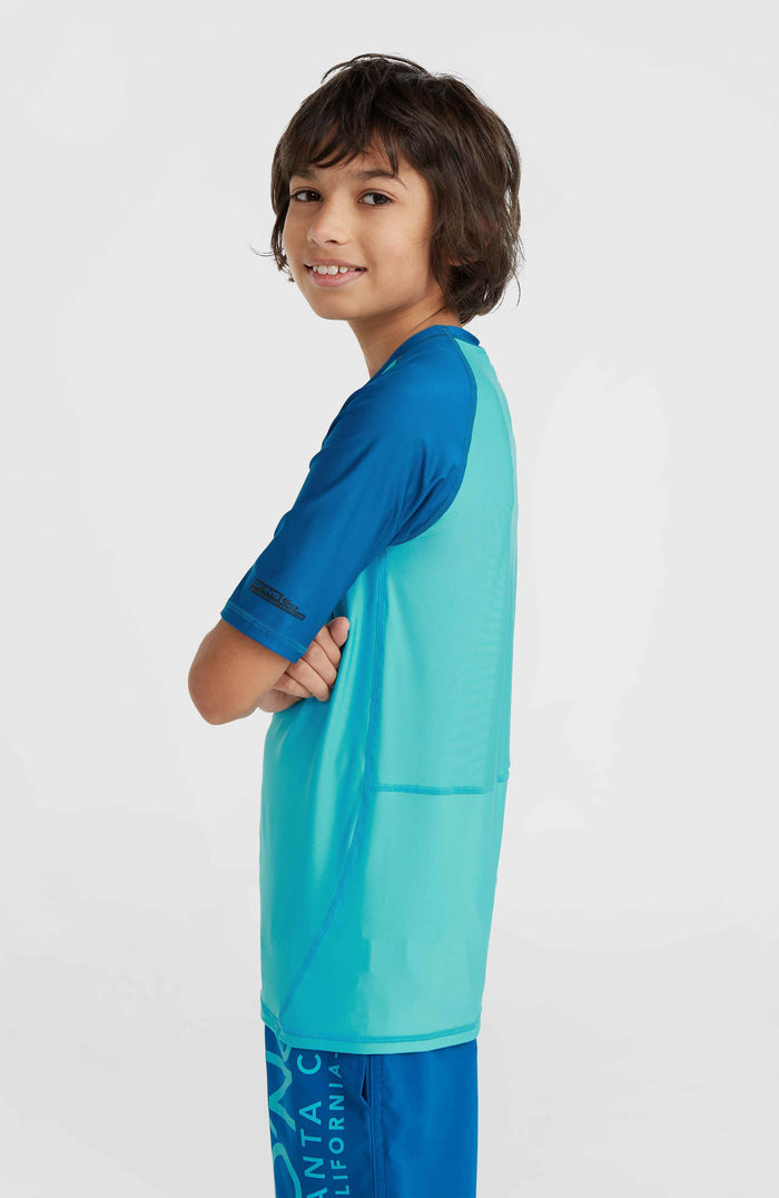 Essentials Cali Short Sleeve Skin | Neon Blue