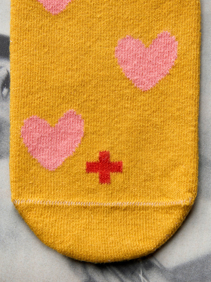 Goldenrod heart sock in gold