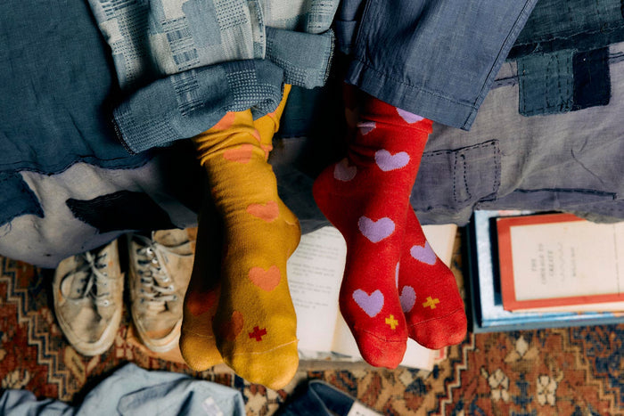 Black heart sock in gold