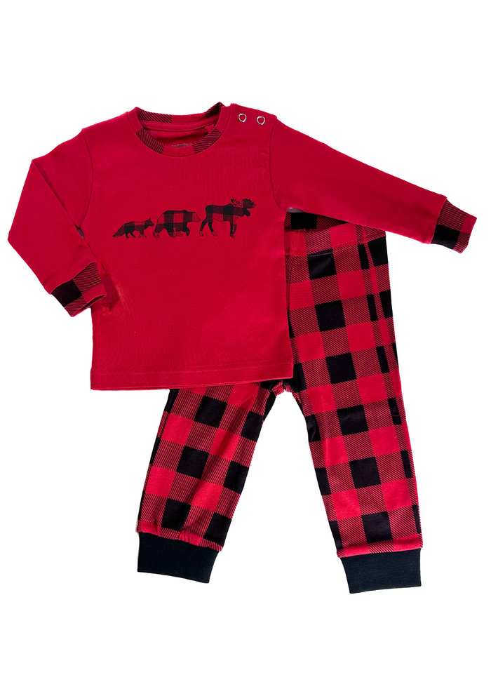 Kids red 2 piece pyjama set with long sleeves, including a top with a black animal print and checkered pants.