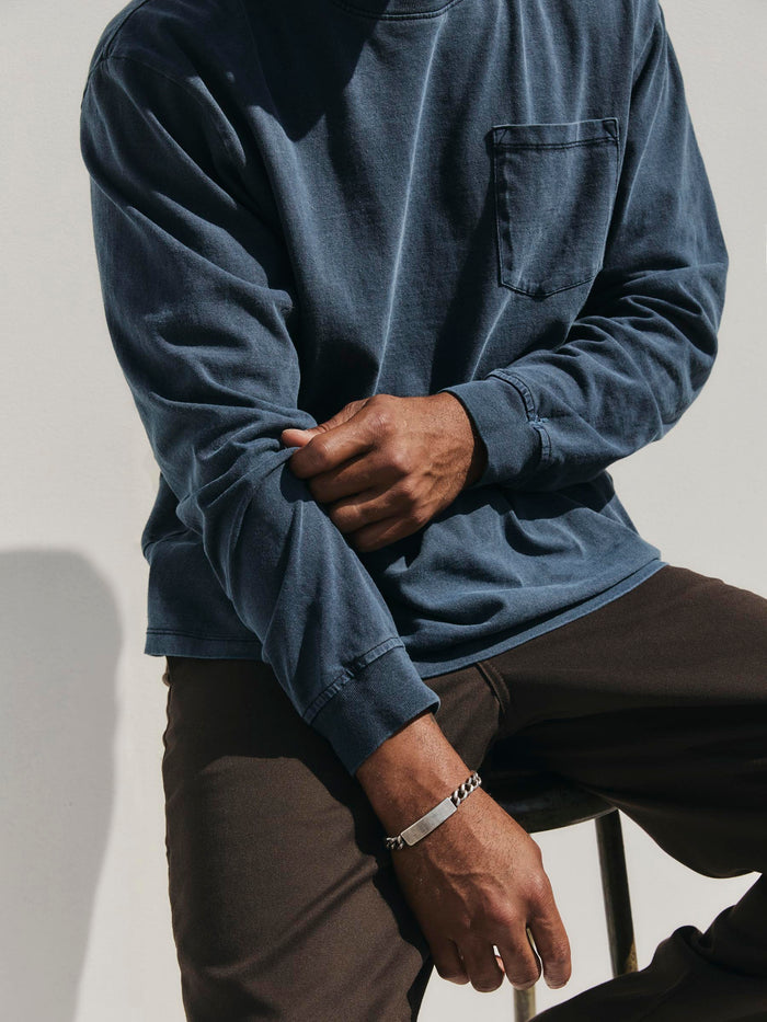 Gray long sleeve pocket tee in faded navy