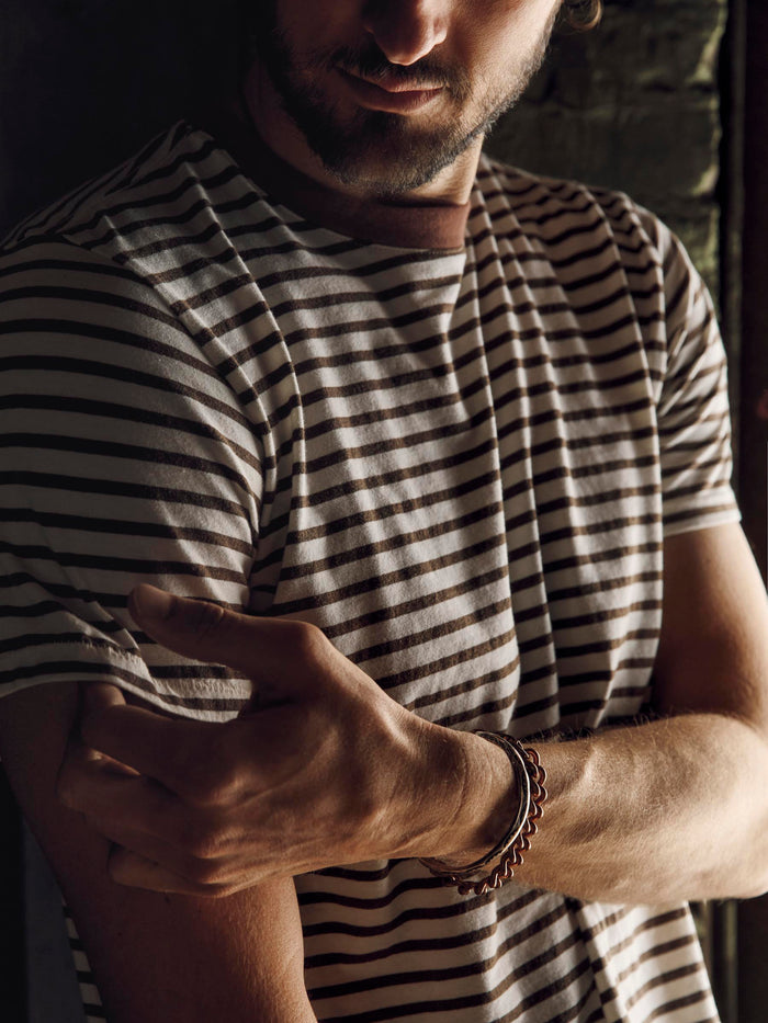 Black novel knit crew in brown stripe
