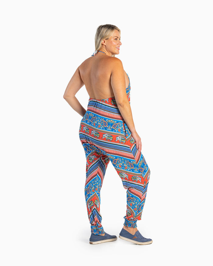 Back view of Savannah harem jumpsuit #color_red elephant