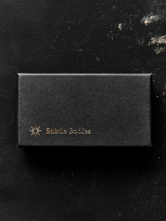 Black subtle bodies brass incense holder