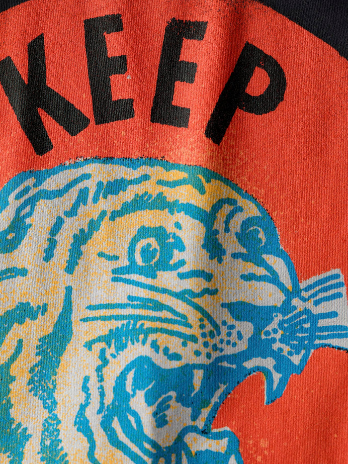 Firebrick the “keep talkin” tee