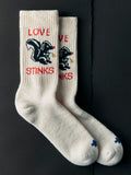 Black the "love stinks" sock