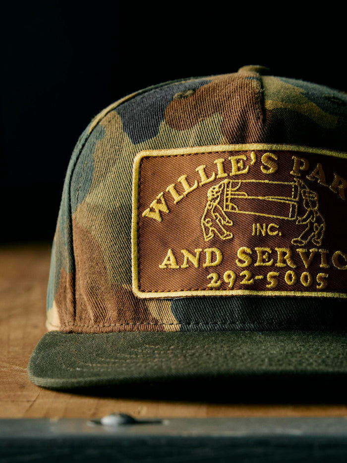 Black the "parts and service" trucker