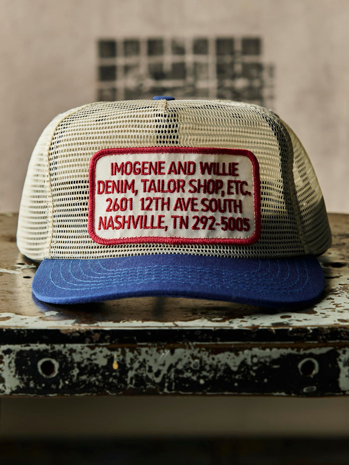 Black the "tailor shop" mesh trucker