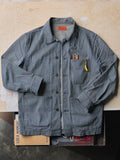 Gray the utility coat in hickory stripe