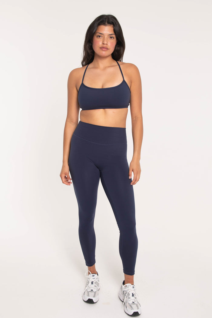 navy sports bra with navy leggings high waisted and thin straps